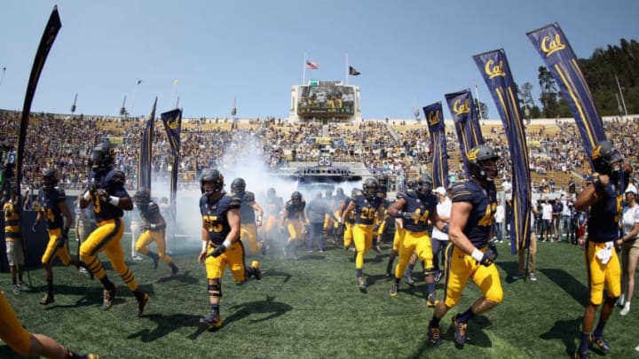BERKELEY, CA - SEPTEMBER 01: The California Golden Bears run on to the field for their game against the North Carolina Tar Heels at California Memorial Stadium on September 1, 2018 in Berkeley, California. (Photo by Ezra Shaw/Getty Images)