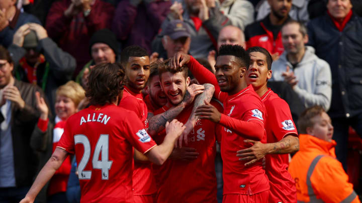 LIVERPOOL, ENGLAND – APRIL 23: Adam Lallana of Liverpool celebrates with team mates after scoring his sides second goal during the Barclays Premier League match between Liverpool and Newcastle United at Anfield on April 23, 2016 in Liverpool, United Kingdom. (Photo by Clive Brunskill/Getty Images)