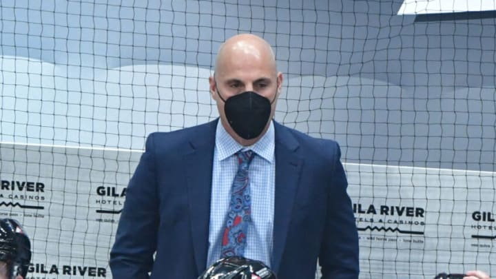 Apr 21, 2021; Glendale, Arizona, USA; Arizona Coyotes head coach Rick Tocchet looks on prior to a game against the Minnesota Wild at Gila River Arena. Mandatory Credit: Matt Kartozian-USA TODAY Sports