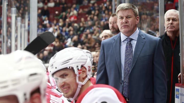 VANCOUVER, BC – DECEMBER 5: Head coach Bill Peters of the Carolina Hurricanes looks on from the bench during their NHL game against the Vancouver Canucks at Rogers Arena December 5, 2017 in Vancouver, British Columbia, Canada. (Photo by Jeff Vinnick/NHLI via Getty Images)’n