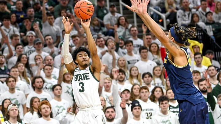 Michigan State’s Jaden Akins makes a 3-poitner against Michigan during the first half on Saturday, Jan. 7, 2023, at the Breslin Center in East Lansing.230107 Msu Mich Bball 078a