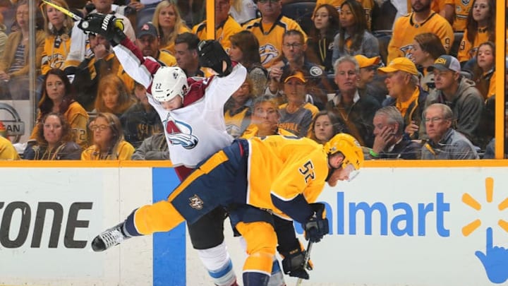 NASHVILLE, TN - APRIL 14: Colin Wilson #22 of the Colorado Avalanche and Matt Irwin #52 of the Nashville Predators collide during the first period in Game Two of the Western Conference First Round during the 2018 NHL Stanley Cup Playoffs at Bridgestone Arena on April 14, 2018 in Nashville, Tennessee. (Photo by Frederick Breedon/Getty Images) NASHVILLE, TN - APRIL 14: Colin Wilson #22 of the Colorado Avalanche and Matt Irwin #52 of the Nashville Predators collide during the first period in Game Two of the Western Conference First Round during the 2018 NHL Stanley Cup Playoffs at Bridgestone Arena on April 14, 2018 in Nashville, Tennessee. (Photo by Frederick Breedon/Getty Images)