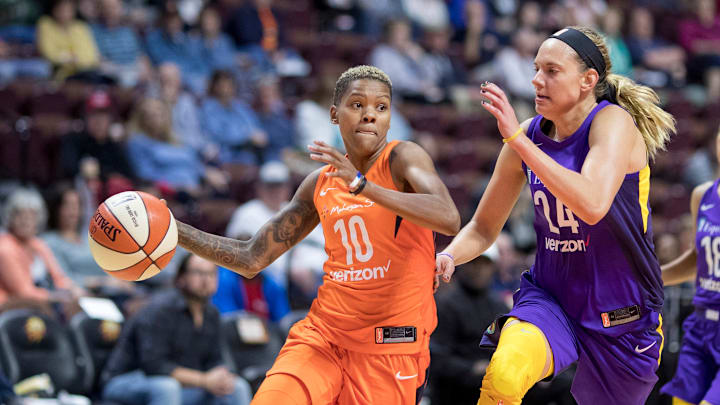 UNCASVILLE, CONNECTICUT- May 7: Courtney Williams #10 of the Connecticut Sun drives to the basket defended by Sydney Wiese #24 of the Los Angeles Sparks during the Connecticut Sun Vs Los Angeles Sparks, WNBA pre season game at Mohegan Sun Arena on May 7, 2018 in Uncasville, Connecticut. (Photo by Tim Clayton/Corbis via Getty Images)