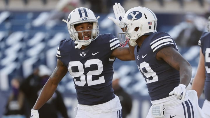 Nov 21, 2020; Provo, UT, USA; BYU wide receiver Chris Jackson (82) congratulates running back Miles Davis (19) after his touchdown in the third quarter against the North Alabama during an NCAA college football game Saturday, Nov. 21, 2020, in Provo, Utah. Mandatory Credit: Jeff Swinger/Pool Photo-USA TODAY NETWORK