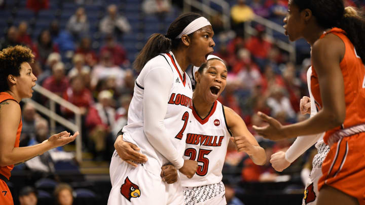 GREENSBORO, NC – MARCH 02: Louisville Cardinals forward Myisha Hines-Allen (2) celebrate with Louisville Cardinals guard Asia Durr (25) after getting fouled on a made basket during the ACC women’s tournament game between the Virginia Tech Hokies and the Louisville Cardinals on March 2, 2018, at Greensboro Coliseum Complex in Greensboro, NC. (Photo by William Howard/Icon Sportswire via Getty Images)