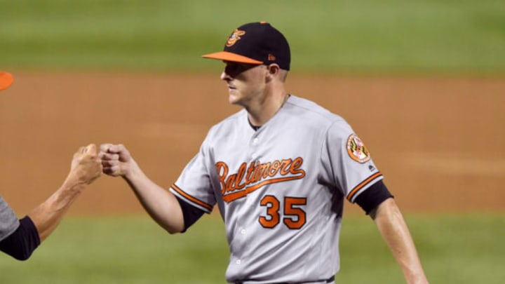 WASHINGTON, DC – JUNE 20: Brad Brach #35 of the Baltimore Orioles celebrates a win after a baseball game against the Washington Nationals at Nationals Park on June 20, 2018 in Washington, DC. (Photo by Mitchell Layton/Getty Images)