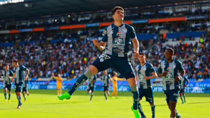 Pachuca's Nicolás Ibáñez celebrates after scoring his team’s first goal during a Liga MX match against Tigres on Sunday. (Photo by Hector Vivas/Getty Images)