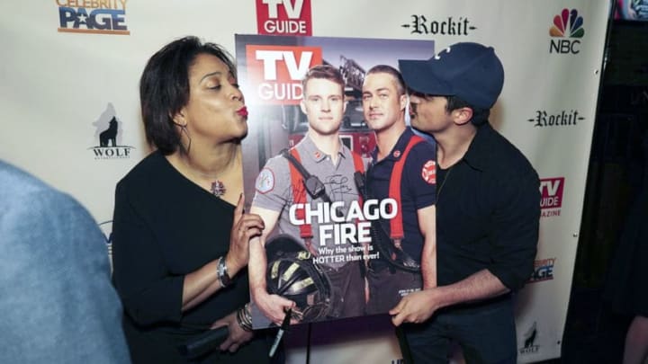 CHICAGO FIRE -- "TV Guide Cover Party" -- Pictured: (l-r) DuShon Brown, Yuri Sardarov -- (Photo by: Elizabeth Morris/NBC)