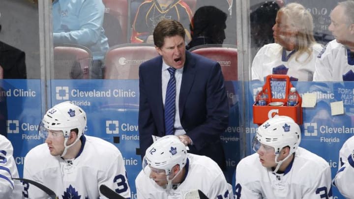 SUNRISE, FL - DECEMBER 28: Head Coach Mike Babcock of the Toronto Maple Leafs reacts to third period action against the Florida Panthers at the BB