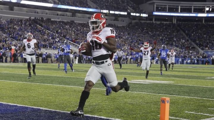 Nov 5, 2016; Lexington, KY, USA; Georgia Bulldogs wide receiver Isaiah McKenzie (16) runs the ball for a touchdown against the Kentucky Wildcats in the first quarter at Commonwealth Stadium. Mandatory Credit: Mark Zerof-USA TODAY Sports