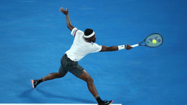MELBOURNE, AUSTRALIA - JANUARY 22: Frances Tiafoe of the United States plays a backhand in his quarter final match against Rafael Nadal of Spain during day nine of the 2019 Australian Open at Melbourne Park on January 22, 2019 in Melbourne, Australia. (Photo by Cameron Spencer/Getty Images)