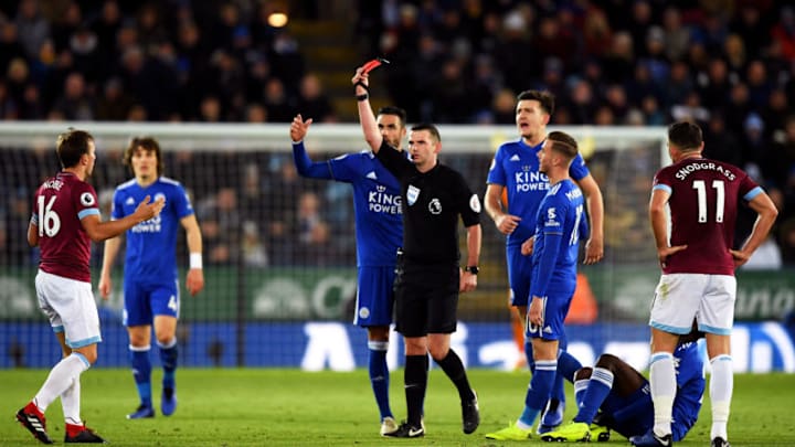 LEICESTER, ENGLAND - OCTOBER 27: Referee Michael Oliver shows Mark Noble of West Ham United a red card during the Premier League match between Leicester City and West Ham United at The King Power Stadium on October 27, 2018 in Leicester, United Kingdom. (Photo by Shaun Botterill/Getty Images)