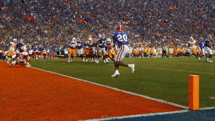Sep 25, 2021; Gainesville, Florida, USA; Florida Gators running back Malik Davis (20) runs the ball in for a touchdown against the Tennessee Volunteers during the first quarter at Ben Hill Griffin Stadium. Mandatory Credit: Kim Klement-USA TODAY Sports