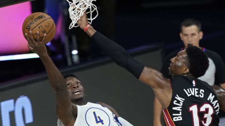 Victor Oladipo #4 of the Indiana Pacers shoots around Bam Adebayo #13 of the Miami Heat during the first half. (Photo by Ashley Landis-Pool/Getty Images)