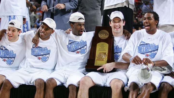 ST. LOUIS – APRIL 04: The North Carolina Tar Heels celebrate with the trophy after defeating the Illinois Fighting Illini 75-70 to win the NCAA Men’s National Championship game at the Edward Jones Dome on April 4, 2005 in St. Louis, Missouri. (Photo by Elsa/Getty Images)