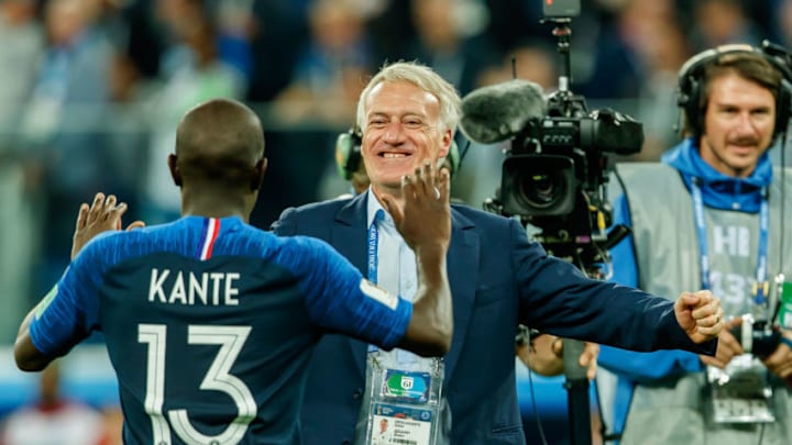 SAINT PETERSBURG, RUSSIA - JULY 10: Head coach Didier Deschamps of France and Ngolo Kante of France celebrate after winning the 2018 FIFA World Cup Russia Semi Final match between France and Belgium at Saint Petersburg Stadium on July 10, 2018 in Saint Petersburg, Russia. (Photo by TF-Images/Getty Images)