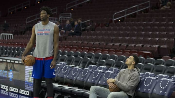 PHILADELPHIA, PA - JANUARY 30: Joel Embiid #21 and Ben Simmons #25 of the Philadelphia 76ers look on prior to the game against the Sacramento Kings at the Wells Fargo Center on January 30, 2017 in Philadelphia, Pennsylvania. NOTE TO USER: User expressly acknowledges and agrees that, by downloading and or using this photograph, User is consenting to the terms and conditions of the Getty Images License Agreement. (Photo by Mitchell Leff/Getty Images)