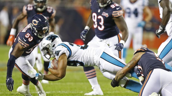 CHICAGO, ILLINOIS – AUGUST 08: Reggie Bonnafon #39 of the Carolina Panthers is tackled by Josh Woods #55 of the Chicago Bears during the second half of a preseason game at Soldier Field on August 08, 2019 in Chicago, Illinois. (Photo by Nuccio DiNuzzo/Getty Images)