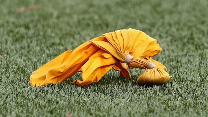 FOXBORO, MA - DECEMBER 24: A detail of a penalty flag during the game between the Buffalo Bills and the New England Patriots at Gillette Stadium on December 24, 2017 in Foxboro, Massachusetts. (Photo by Tim Bradbury/Getty Images) FOXBORO, MA - DECEMBER 24: A detail of a penalty flag during the game between the Buffalo Bills and the New England Patriots at Gillette Stadium on December 24, 2017 in Foxboro, Massachusetts. (Photo by Tim Bradbury/Getty Images)