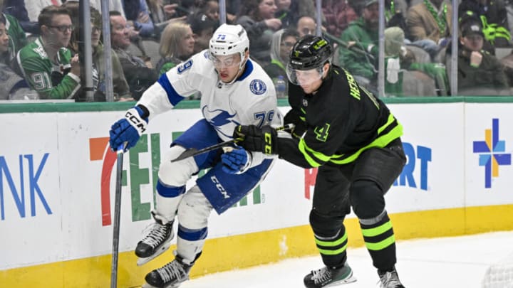 Feb 11, 2023; Dallas, Texas, USA; Tampa Bay Lightning center Ross Colton (79) and Dallas Stars defenseman Miro Heiskanen (4) in action during the game between the Dallas Stars and the Tampa Bay Lightning at American Airlines Center. Mandatory Credit: Jerome Miron-USA TODAY Sports