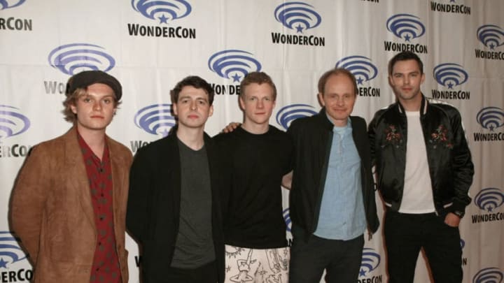 ANAHEIM, CALIFORNIA - MARCH 29: (L-R) Tom Glynn-Carney, Anthony Boyle, Patrick Gibson, Dome Karukoski, and Nicholas Hoult attends the "Tolkien" press line during WonderCon 2019 at Anaheim Convention Center on March 29, 2019 in Anaheim, California. (Photo by Paul Butterfield/Getty Images)