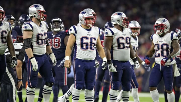 HOUSTON, TX - DECEMBER 1: Joe Thuney #62, James Ferentz #66 and Shaq Mason #69 of the New England Patriots at the line of scrimmage during the second half of a game against the Houston Texans at NRG Stadium on December 1, 2019 in Houston, Texas. The Texans defeated the Patriots 28-22. (Photo by Wesley Hitt/Getty Images)