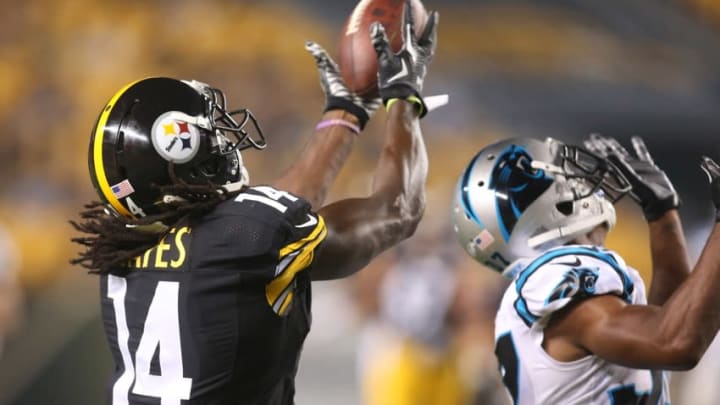 Sep 3, 2015; Pittsburgh, PA, USA; Pittsburgh Steelers wide receiver Sammie Coates (14) catches a pass behind Carolina Panthers defensive back Carrington Byndom (R) during the fourth quarter at Heinz Field. Carolina won 23-6. Mandatory Credit: Charles LeClaire-USA TODAY Sports