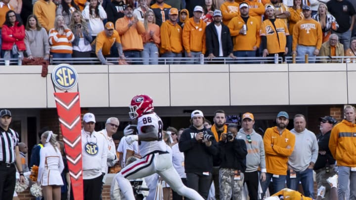 KNOXVILLE, TN - NOVEMBER 18: Dillon Bell #86 of the Georgia Bulldogs scores a touchdown during a game between the University of Georgia and the University of Tennessee at Neyland Stadium on November 18, 2023 in Knoxville, Tennessee. (Photo by Steve Limentani/ISI Photos/Getty Images)