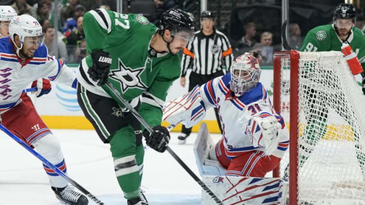 DALLAS, TEXAS - NOVEMBER 20: Igor Shesterkin #31 of the New York Rangers watches as Mason Marchment #27 of the Dallas Stars plays the puck in front of the net during the first period at American Airlines Center on November 20, 2023 in Dallas, Texas. (Photo by Sam Hodde/Getty Images)