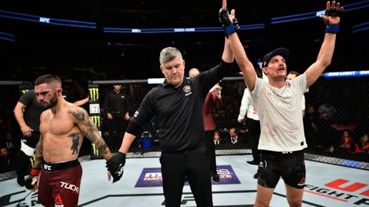 EDMONTON, AB - SEPTEMBER 09: (R-L) Rick Glenn celebrates his victory over Gavin Tucker of Canada in their featherweight bout during the UFC 215 event inside the Rogers Place on September 9, 2017 in Edmonton, Alberta, Canada. (Photo by Jeff Bottari/Zuffa LLC/Zuffa LLC via Getty Images)
