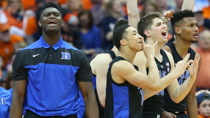 SYRACUSE, NY – FEBRUARY 23: Zion Williamson (L) of the Duke Blue Devils celebrates a three-point basket with teammates against the Syracuse Orange during the second half at the Carrier Dome on February 23, 2019 in Syracuse, New York. Duke defeated Syracuse 75-65. (Photo by Rich Barnes/Getty Images)