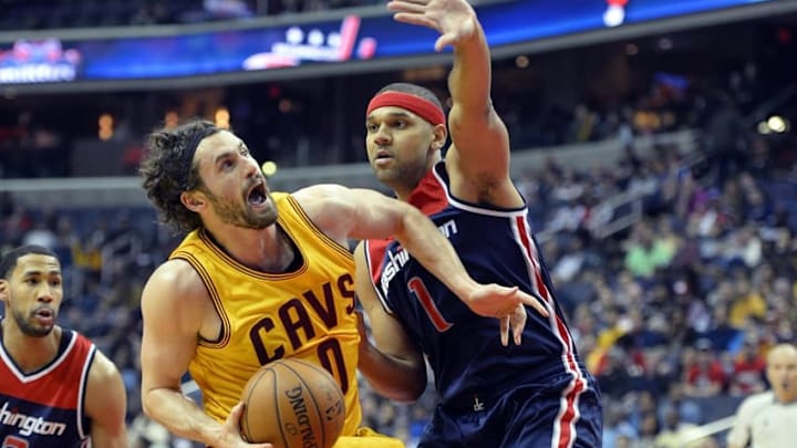 Feb 28, 2016; Washington, DC, USA; Cleveland Cavaliers forward Kevin Love (0) drives to the basket as Washington Wizards forward Jared Dudley (1) defends during the first half at Verizon Center. Mandatory Credit: Tommy Gilligan-USA TODAY Sports