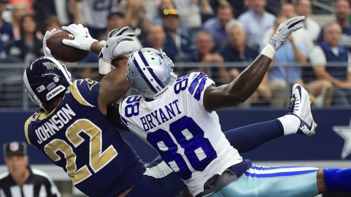 ARLINGTON, TX - OCTOBER 01: Trumaine Johnson #22 of the Los Angeles Rams nearly intercepts a ball intended for Dez Bryant #88 of the Dallas Cowboys in the first half of a game at AT&T Stadium on October 1, 2017 in Arlington, Texas. (Photo by Ronald Martinez/Getty Images)