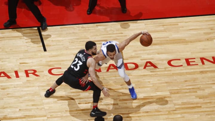 TORONTO, CANADA - JANUARY 13: Stephen Curry #30 of the Golden State Warriors handles the ball against the Toronto Raptors on January 13, 2018 at the Air Canada Centre in Toronto, Ontario, Canada. NOTE TO USER: User expressly acknowledges and agrees that, by downloading and or using this Photograph, user is consenting to the terms and conditions of the Getty Images License Agreement. Mandatory Copyright Notice: Copyright 2018 NBAE (Photo by Mark Blinch/NBAE via Getty Images)