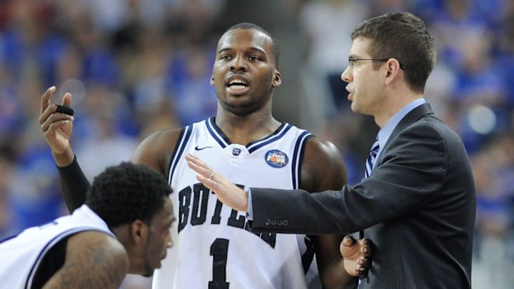 Butler’s Shelvin Mack talks with coach Brad Stevens