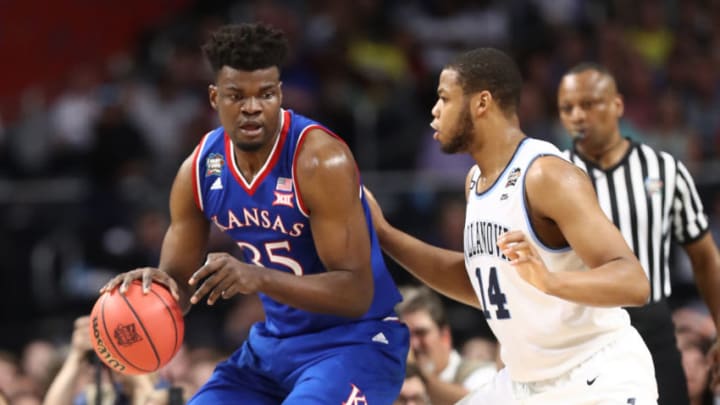 SAN ANTONIO, TX - MARCH 31: Udoka Azubuike #35 of the Kansas Jayhawks is defended by Omari Spellman #14 of the Villanova Wildcats in the first half during the 2018 NCAA Men's Final Four Semifinal at the Alamodome on March 31, 2018 in San Antonio, Texas. (Photo by Ronald Martinez/Getty Images)
