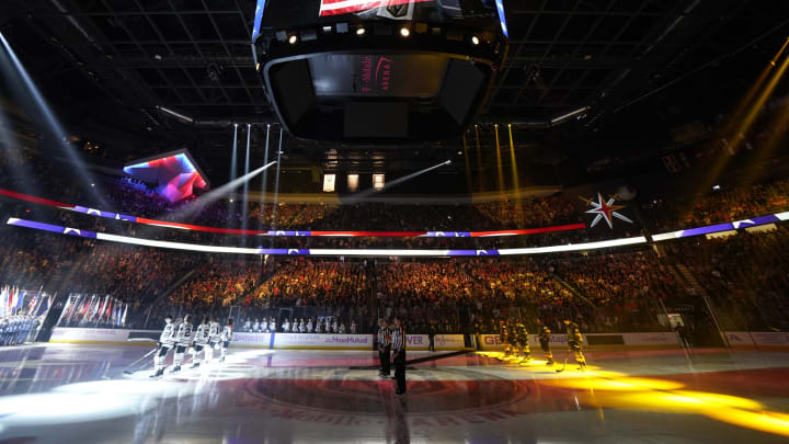 LAS VEGAS, NEVADA – NOVEMBER 13: Vegas Golden Knights and Chicago Blackhawks players stand at attention for the national anthem prior to their game at T-Mobile Arena on November 13, 2019 in Las Vegas, Nevada. (Photo by Jeff Bottari/NHLI via Getty Images)