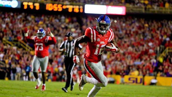 Oct 22, 2016; Baton Rouge, LA, USA; Mississippi Rebels wide receiver Van Jefferson (12) runs after a catch for a touchdown against the LSU Tigers during the first quarter of a game at Tiger Stadium. Mandatory Credit: Derick E. Hingle-USA TODAY Sports