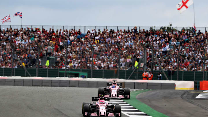 NORTHAMPTON, ENGLAND - JULY 16: Esteban Ocon of France driving the (31) Sahara Force India F1 Team VJM10 leads Sergio Perez of Mexico driving the (11) Sahara Force India F1 Team VJM10 on track during the Formula One Grand Prix of Great Britain at Silverstone on July 16, 2017 in Northampton, England. (Photo by Mark Thompson/Getty Images)