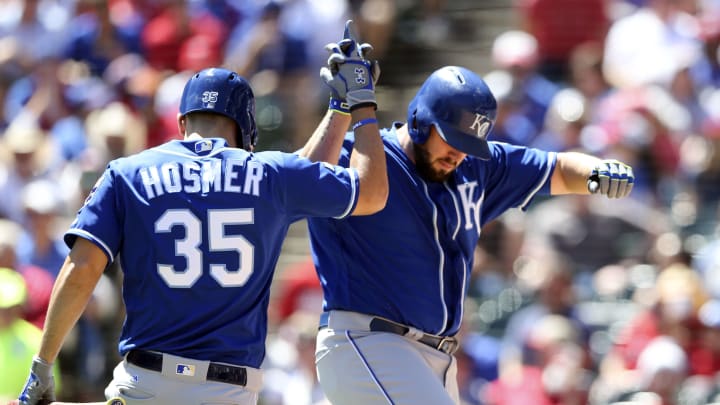KC Royals designated hitter Mike Moustakas (8) celebrates with first baseman Eric Hosmer (35) after hitting a home run -Mandatory Credit: Kevin Jairaj-USA TODAY Sports
