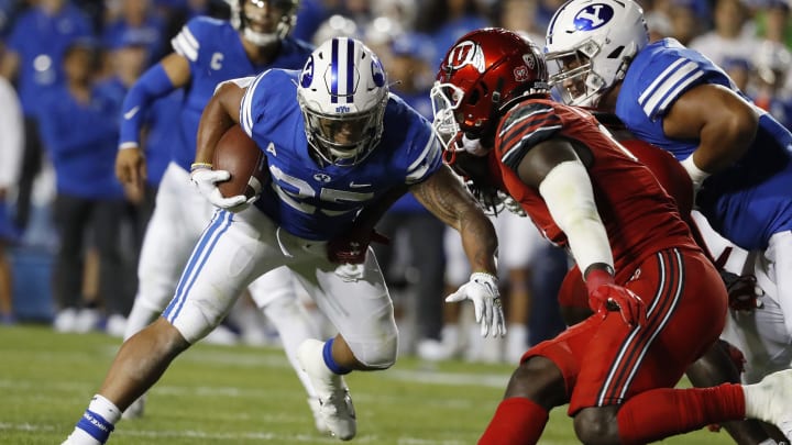 Sep 11, 2021; Provo, Utah, USA; Brigham Young Cougars running back Tyler Allgeier (25) runs the ball in the second quarter against the Utah Utes at LaVell Edwards Stadium. Mandatory Credit: Jeffrey Swinger-USA TODAY Sports