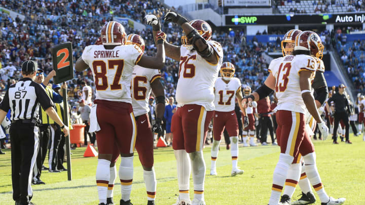 JACKSONVILLE, FL – DECEMBER 16: Jeremy Sprinkle #87 of the Washington Redskins celebrates with teammates following his second half touchdown against the Jacksonville Jaguars at TIAA Bank Field on December 16, 2018 in Jacksonville, Florida. (Photo by Sam Greenwood/Getty Images)