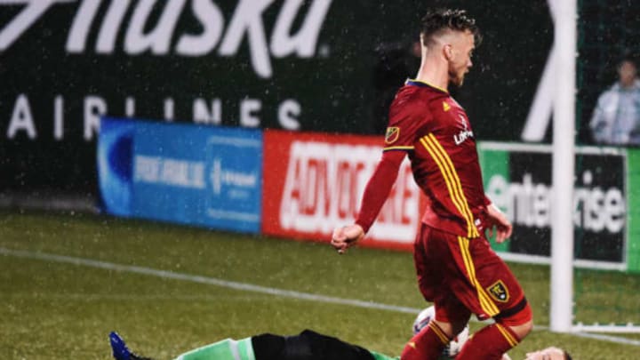 Feb 15, 2017; Portland, OR, USA; Minnesota United FC goalkeeper Patrick McLain (24) comes out to stop the shot of Real Salt Lake midfielder Albert Rusnak (11) during the first half of the game at Providence Park. Mandatory Credit: Steve Dykes-USA TODAY Sports