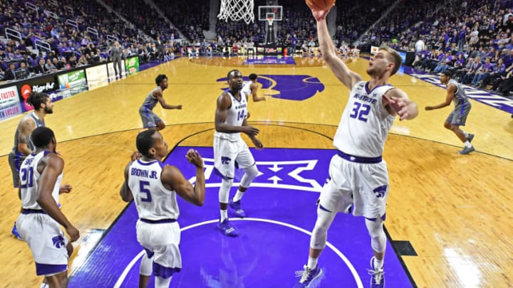 MANHATTAN, KS - DECEMBER 15: Dean Wade #32 of the Kansas State Wildcats grabs a defensive rebound during the second half against the Georgia State Panthers on December 15, 2018 at Bramlage Coliseum in Manhattan, Kansas. (Photo by Peter Aiken/Getty Images)