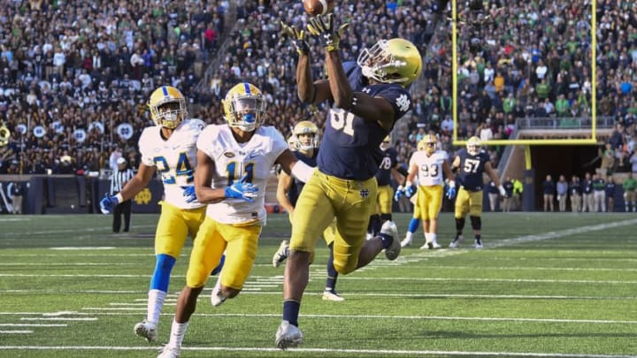 SOUTH BEND, IN - OCTOBER 13: Miles Boykin #81 of the Notre Dame Fighting Irish catches a touchdown pass against Dane Jackson #11 of the Pittsburgh Panthers to take the lead in the second half at Notre Dame Stadium on October 13, 2018 in South Bend, Indiana. (Photo by Quinn Harris/Getty Images)