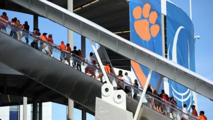 Dec 31, 2015; Miami Gardens, FL, USA; Fans arrive prior to the 2015 CFP semifinal at the Orange Bowl between the Clemson Tigers and the Oklahoma Sooners at Sun Life Stadium. Mandatory Credit: Robert Duyos-USA TODAY Sports