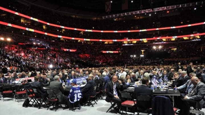 Jun 26, 2015; Sunrise, FL, USA; General view of team executives on the arena floor in the first round of the 2015 NHL Draft at BB&T Center. Mandatory Credit: Steve Mitchell-USA TODAY Sports