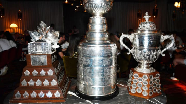 LAS VEGAS, NEVADA - JUNE 17: (L-R) The Conn Smythe Trophy, The Stanley Cup and the Clarence S. Campbell Bowl at Barry’s Downtown Prime at Circa Resort & Casino.Resort on June 17, 2023 in Las Vegas, Nevada. (Photo by Denise Truscello/Getty Images for Circa Resort & Casino)