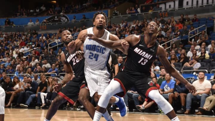 ORLANDO, FL - OCTOBER 7: Khem Birch #24 of the Orlando Magic battles for position against Erik McCree #22 and Bam Adebayo #13 of the Miami Heat during a preseason game on October 8, 2017 at Amway Center in Orlando, Florida. NOTE TO USER: User expressly acknowledges and agrees that, by downloading and or using this photograph, User is consenting to the terms and conditions of the Getty Images License Agreement. Mandatory Copyright Notice: Copyright 2017 NBAE (Photo by Gary Bassing/NBAE via Getty Images)