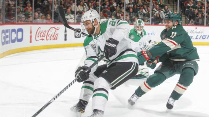 ST. PAUL, MN - MARCH 29: Greg Pateryn #29 of the Dallas Stars skates with the puck while Zach Parise #11 of the Minnesota Wild defends during the game at the Xcel Energy Center on March 29, 2018 in St. Paul, Minnesota. (Photo by Bruce Kluckhohn/NHLI via Getty Images)